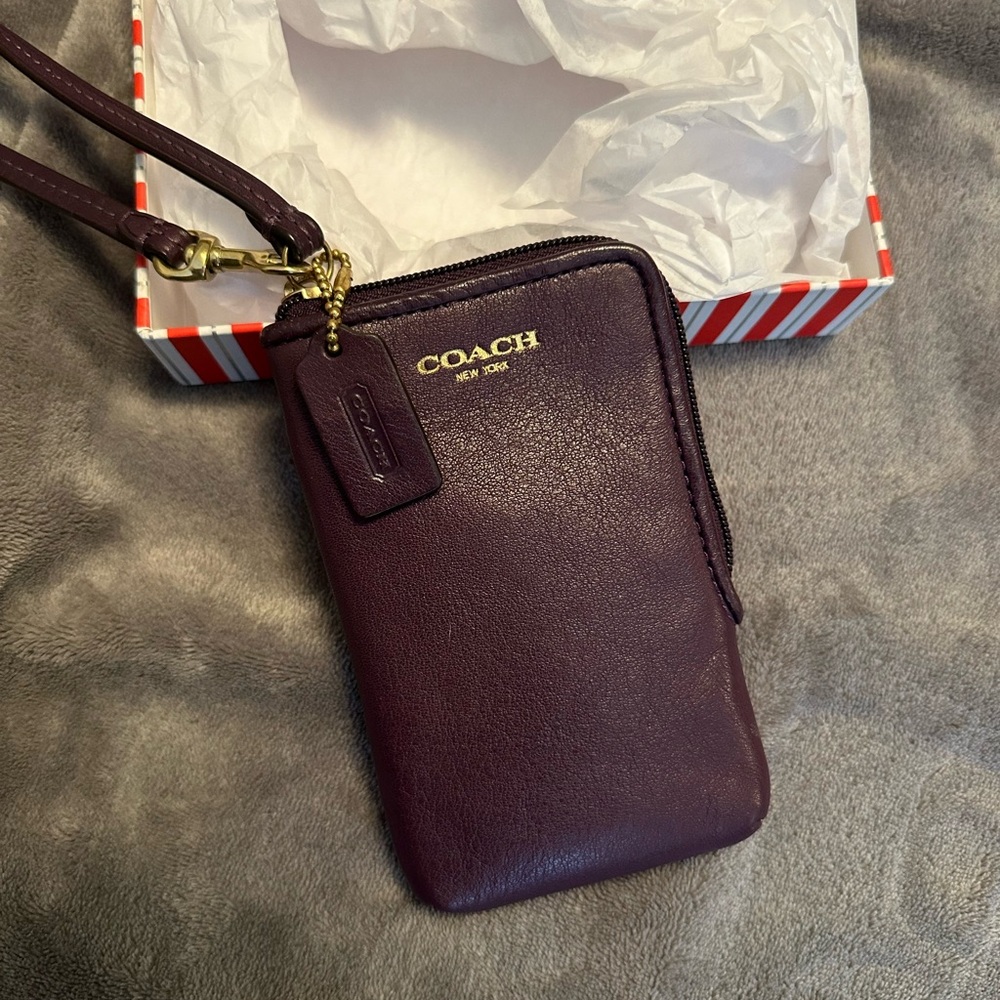Coach leather wristlet/phone wallet.
